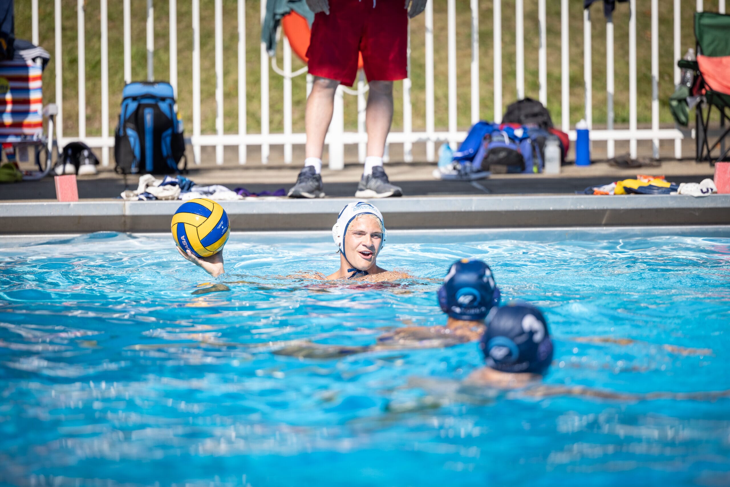 Lifeguard playing water polo with Renegades Water Polo team