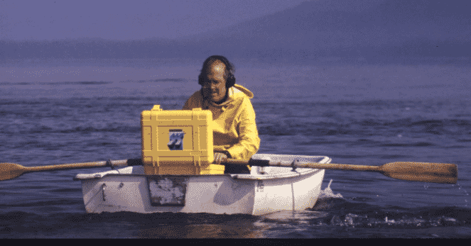 Roger Payne, rowing boat, listening for whales